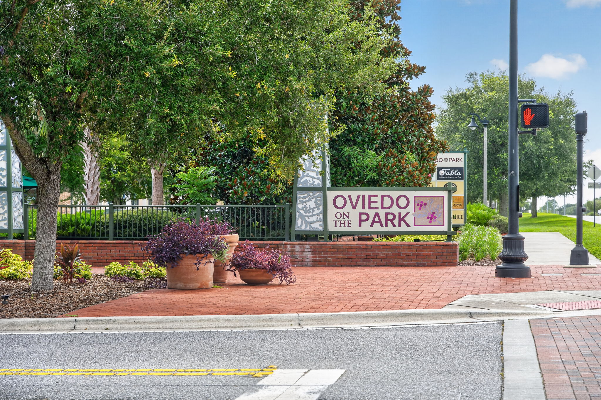 Entrance signage at Oviedo on the Park, a mixed-use development in Oviedo, Florida
